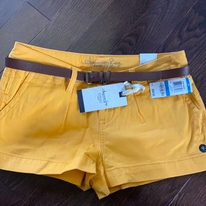 NWT American Rag juniors size 9 yellow shorts with belt